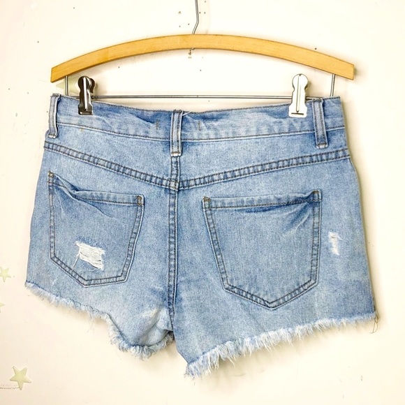 FREE people button fly, raw hem distressed shorts - Picture 5 of 10